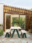 Gartentisch aus Holz und Stahl in Hunter Green - OVERLAP TABLE von Skagerak