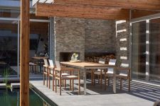 Sitzgruppe auf Terrasse mit Gartentisch aus Teak und Edelstahl - NOAH von Traditional Teak