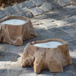 FLOWER von Jan Kurtz ist ein Windlicht gearbeitet aus einer Teakholzwurzel für den Außenbereich. FLOWER von Jan Kurtz - Windlicht aus einer Teakwurzel