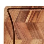 Die Saftrille am Rand des Schneidebretts ARC CARVINGBOARD aus Akazie von Andersen Furniture verhindert, das Flüssigkeiten auf die Arbeitsfläche in der Küche gelangen  Schneidebrett aus Akazie im dänischen Design ARC CARVINGBOARD von Andersen Furniture