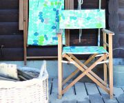 Regiestuhl aus Holz mit Bezug in Blume Greenwich MAXX von Jan Kurtz