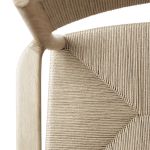 Detailansicht der Sitzfläche des Armlehnstuhls ARV CHAIR von Brdr. Krüger aus geflochtenen Papierkordeln Detail Esstisch Armlehnstuhl aus Holz Eiche mit Geflecht - ARV CHAIR von Brdr. Krüger