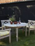 Ob im Garten oder auf der Terrasse: der runde Gartentisch DRACHMANN von Skagerak wird zum echten Highlight im Außenbereich Teak Gartentisch rund für 4 Personen - DRACHMANN TABLE von Skagerak