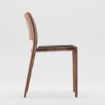 Eine organische, geschwungene Form sowie die angenehme Polsterung machen den Stuhl LATUS aus Massivholz von Artisan zu einer komfortablen Sitzgelegenheit Stuhl aus Massivholz gepolstert Latus Chair von Artisan