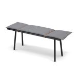 Die 120 cm lange Design Sitzbank GEORG BENCH von Skagerak - hier das Modell aus schwarz lackiertem Eichenholz in Kombination mit einem hellgrauen Wollkissen Holzbank in Eiche schwarz lackiert - GEORG BENCH von Skagerak