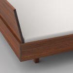 Seitenansicht des modernen Holzbettes QUADRA in Nussbaum geölt modernes Bett in Nussbaum geölt QUADRA von vitamin design