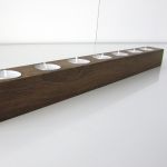 Kerzenhalter BRENNHOLZ aus massivem Holz von Raumgestalt für sieben Teelichter Kerzenhalter BRENNHOLZ aus massivem Holz von Raumgestalt für sieben Teelichter